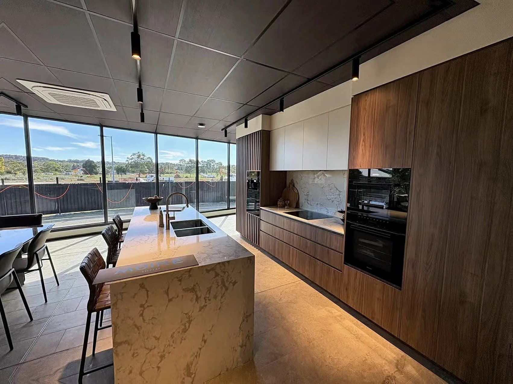 Timber kitchen display joinery in a commercial showroom