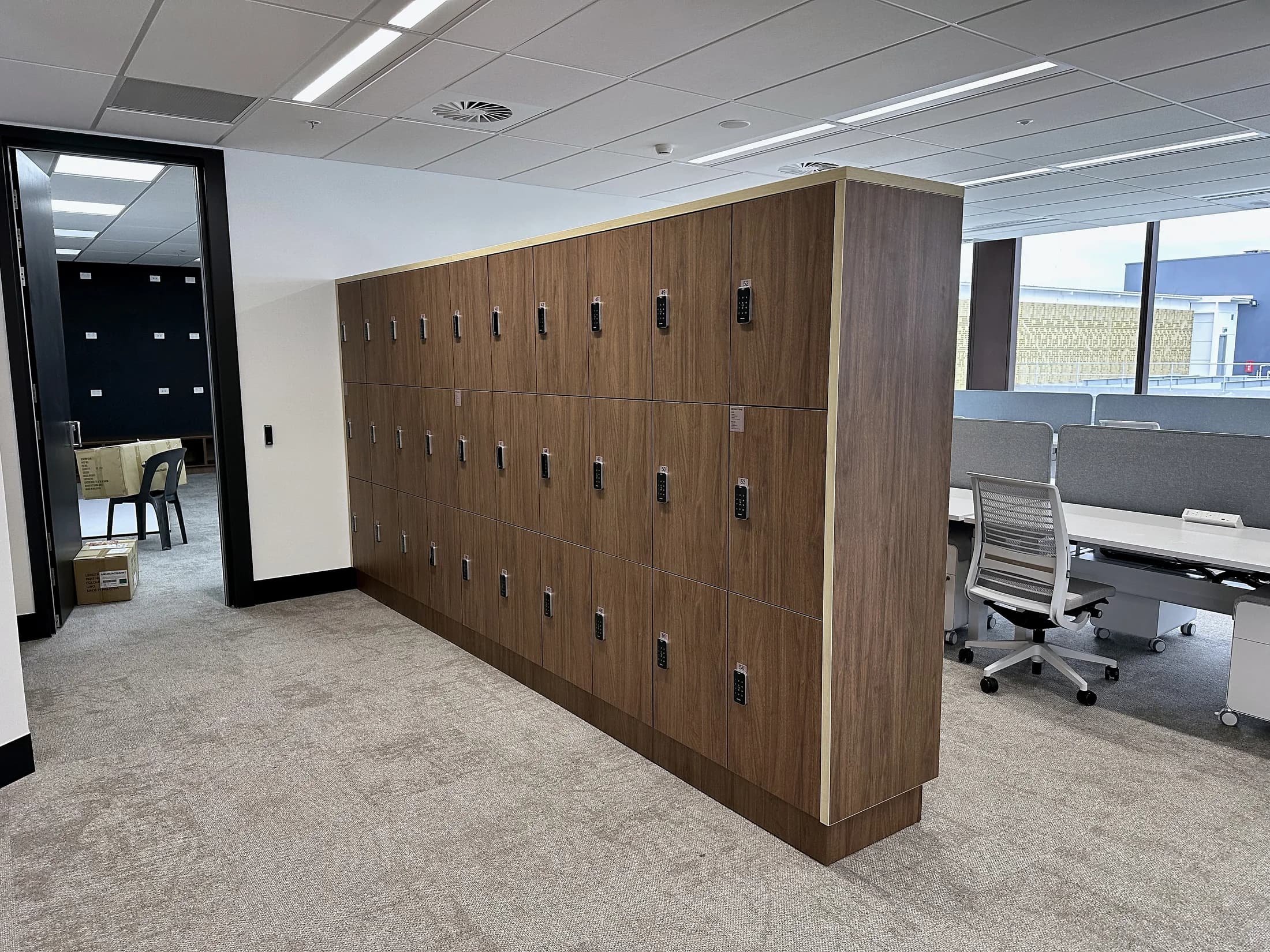 Timber locker and storage joinery in a commercial staff area